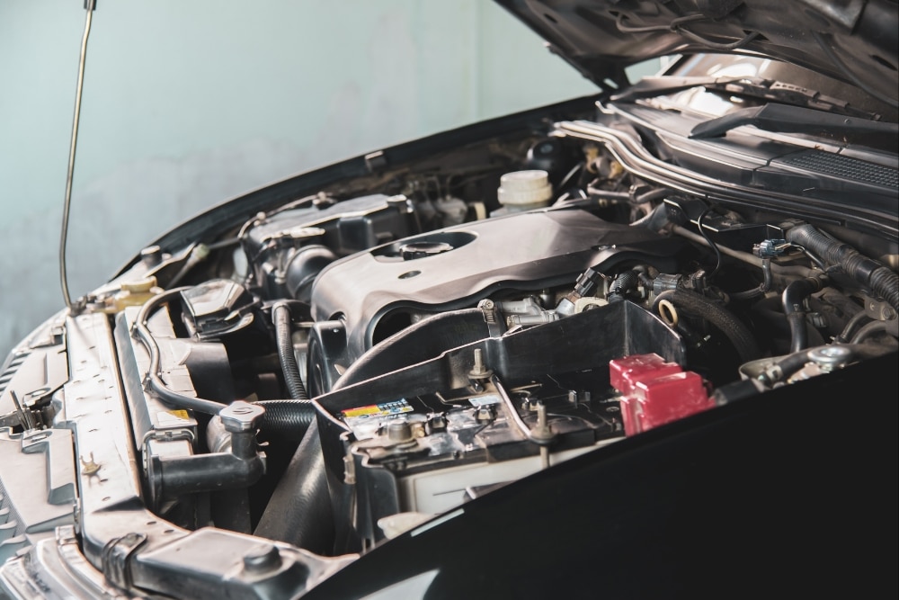 Winter Car Maintenance, Winter Prep in Millersport, OH At Kreager Tire And Service. Close-up of a vehicle with its hood open during inspection or maintenance
