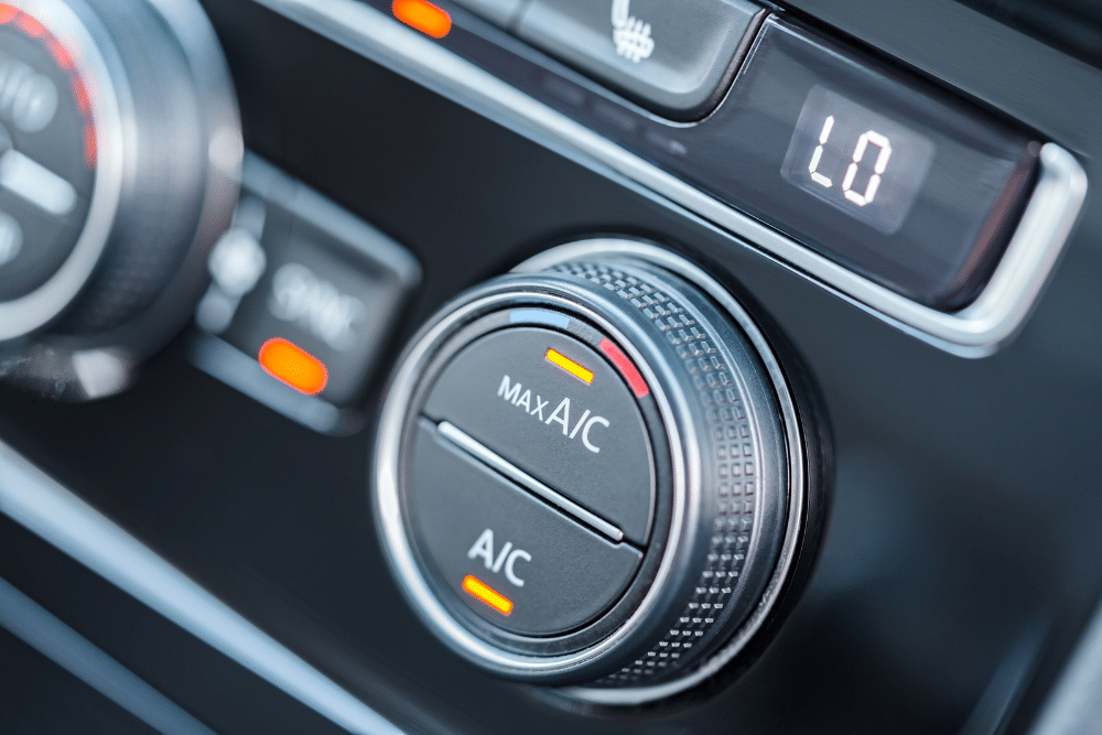 Auto A/C and Heat Repair in Millersport OH at Kreager Tire & Service. Close-up view of a vehicle air conditioning system