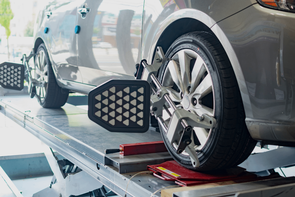 Wheel Alignment in Millersport OH At Kreager Tire And Service. Close-up of a vehicle undergoing wheel alignment